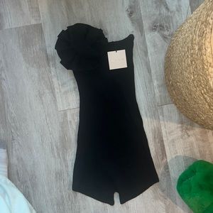 super down revolve onesie with flower